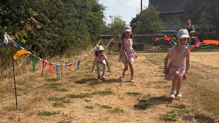 Child enjoying Summer of Play at Canons Ashby, Northamptonshire